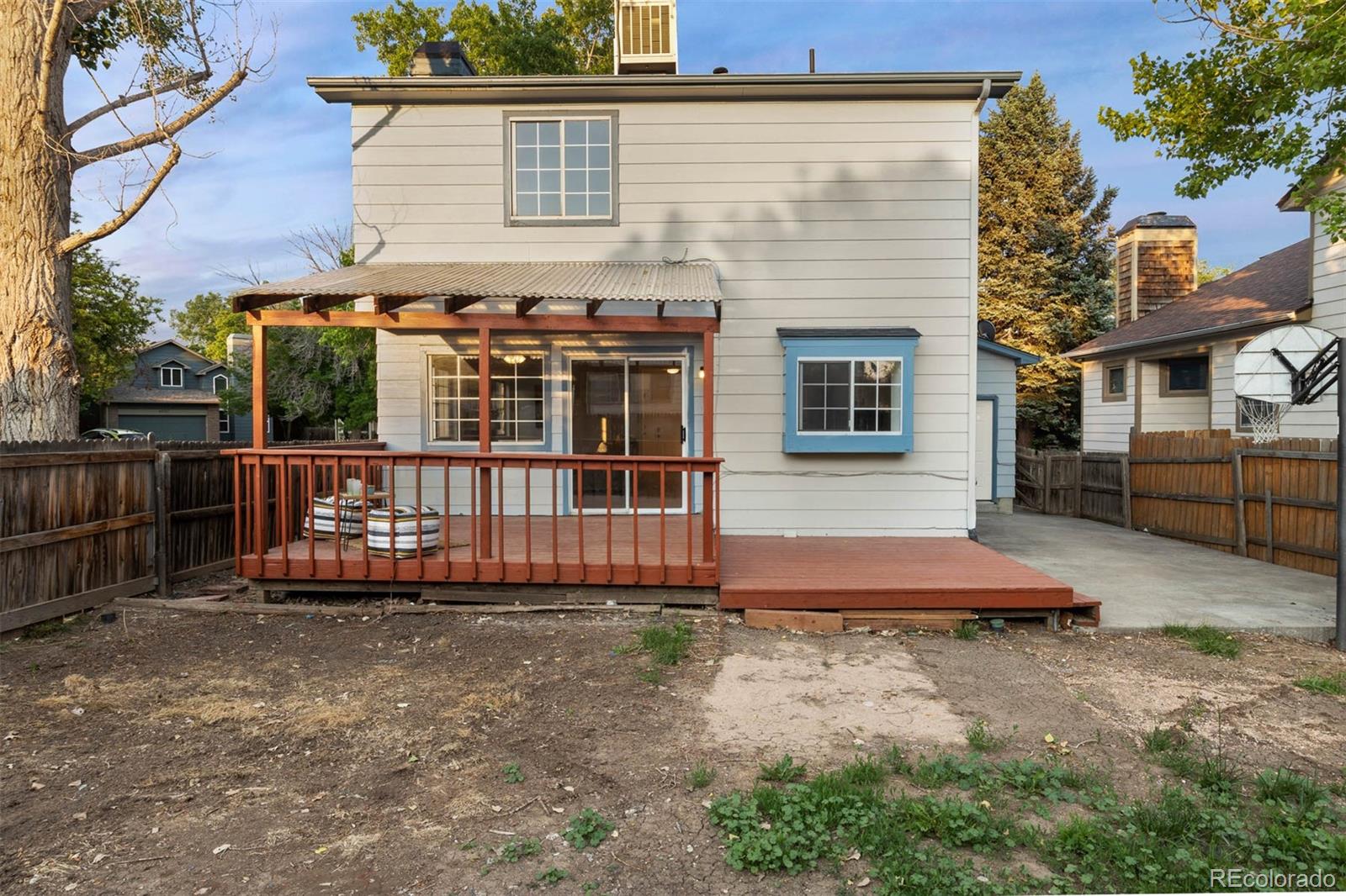 6283 Xavier Street Arvada, CO 80003 - Photo 34 of 36 a front view of a house with a yard