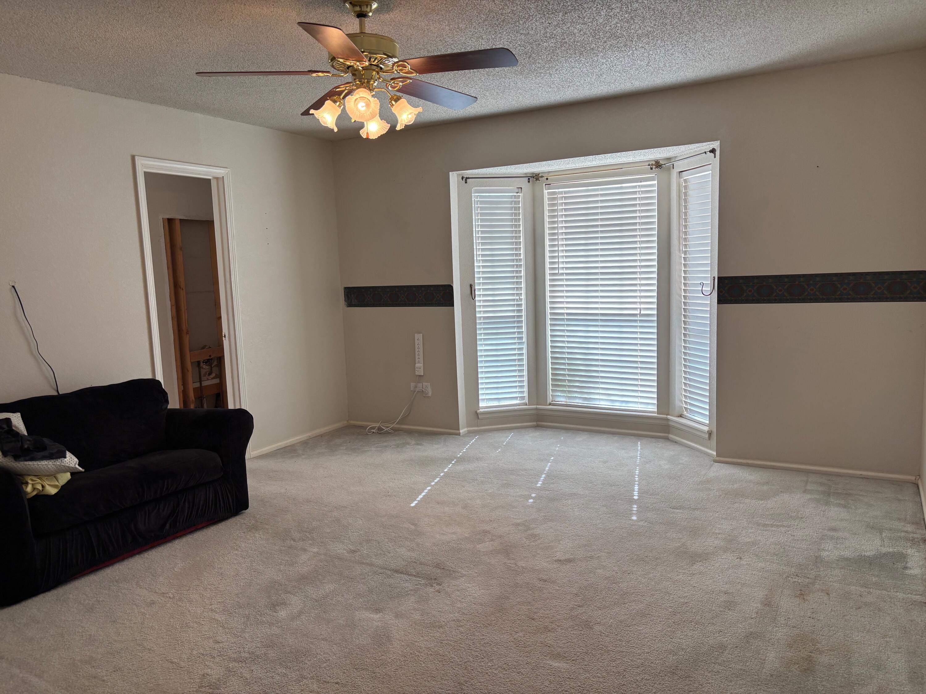 1502 Culpepper Avenue Wilson, TX 79381 - Photo 9 of 26 a view of an empty room with a window
