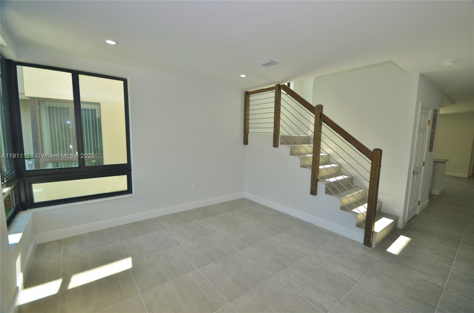 4374 East 10th Avenue, Unit 4374 Hialeah, FL 33013 - Photo 5 of 29 a view of an entryway