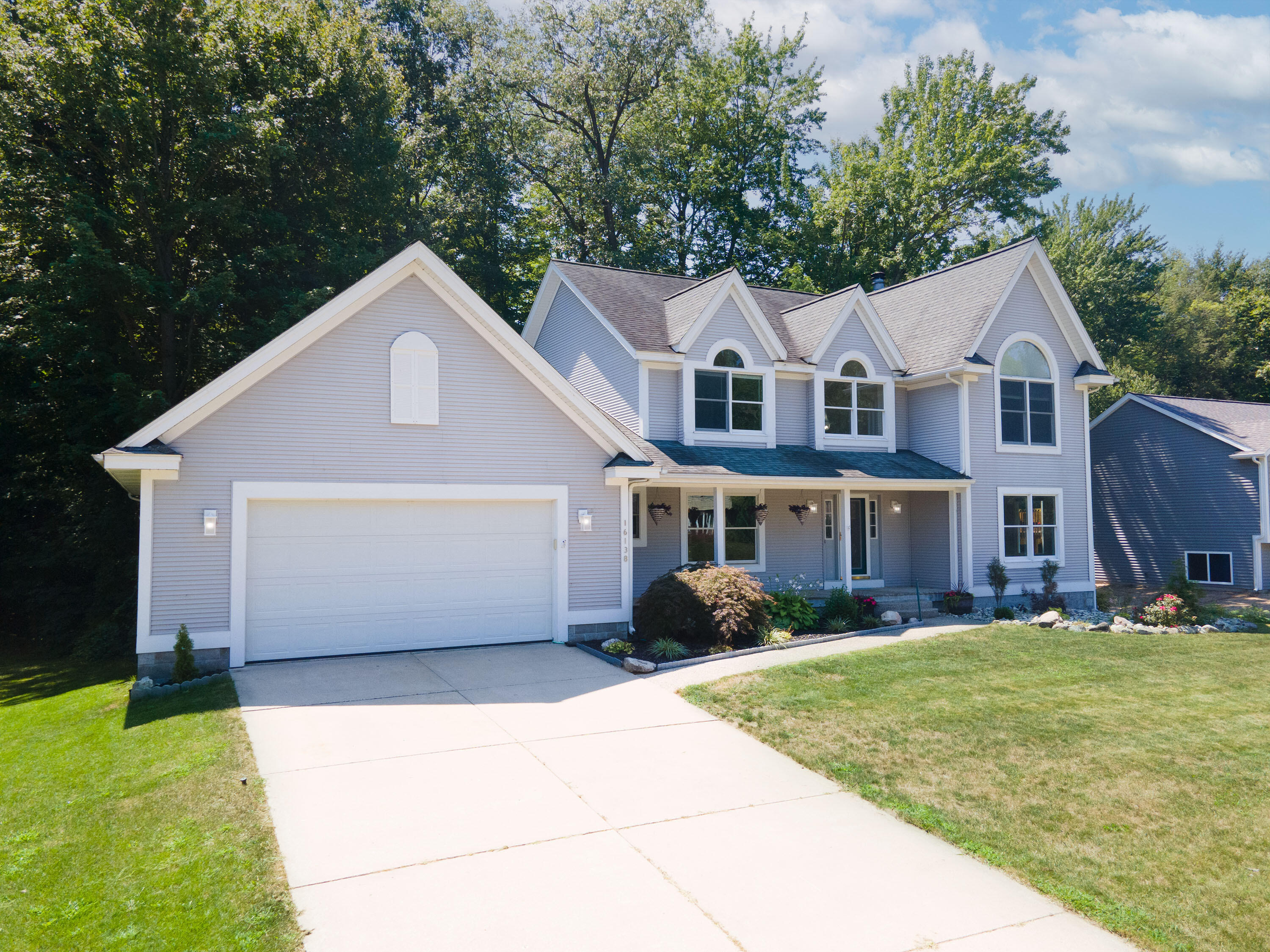 16138 Terrace Road Spring Lake, MI 49456 - Photo 3 of 27 3. Exterior Left Corner