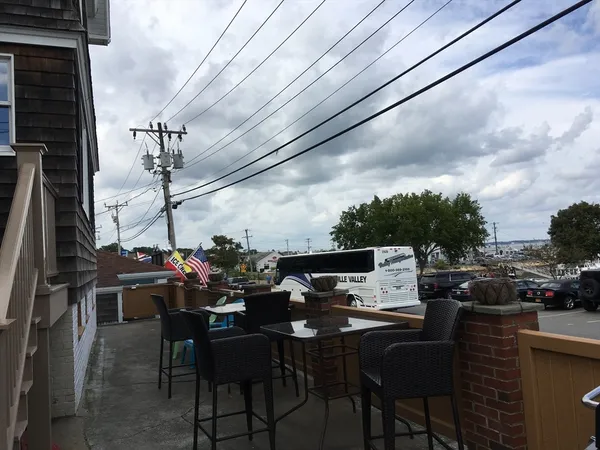 a view of a dinning table and chairs in the terrace