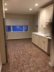 a kitchen with stainless steel appliances a cabinets and a sink