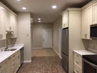 a bathroom with a sink a mirror and a shower