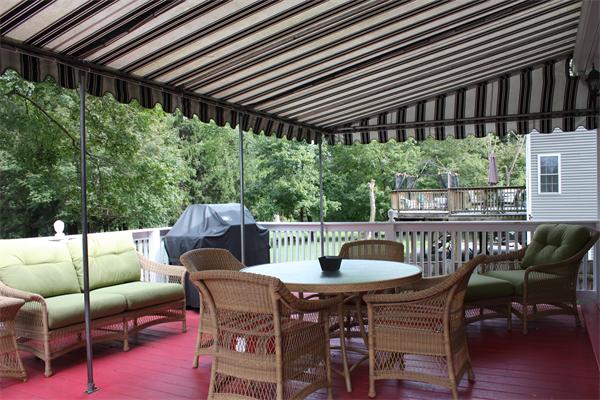 490 Brook Road Milton, MA 02186 - Photo 18 of 24 a view of a chairs and table in the patio