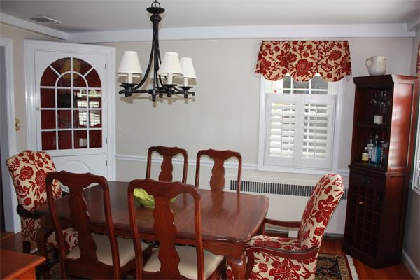 490 Brook Road Milton, MA 02186 - Photo 8 of 24 a view of a dining room with furniture window and outside view