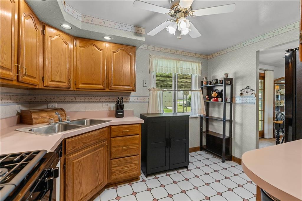 189 William Circle McKees Rocks, PA 15136 - Photo 11 of 24 a kitchen with stainless steel appliances granite countertop a refrigerator sink and cabinets