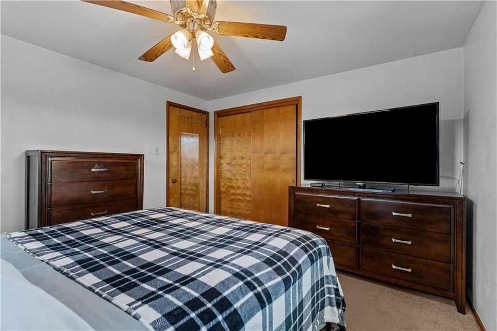 189 William Circle McKees Rocks, PA 15136 - Photo 17 of 24 a bedroom with a bed and a flat screen tv