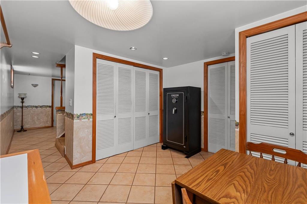 189 William Circle McKees Rocks, PA 15136 - Photo 23 of 24 a bedroom with a bed and a mirror