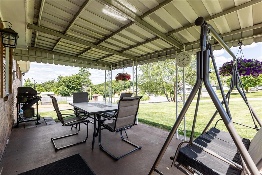 189 William Circle McKees Rocks, PA 15136 - Photo 3 of 24 a view of a patio with a table chairs and a backyard