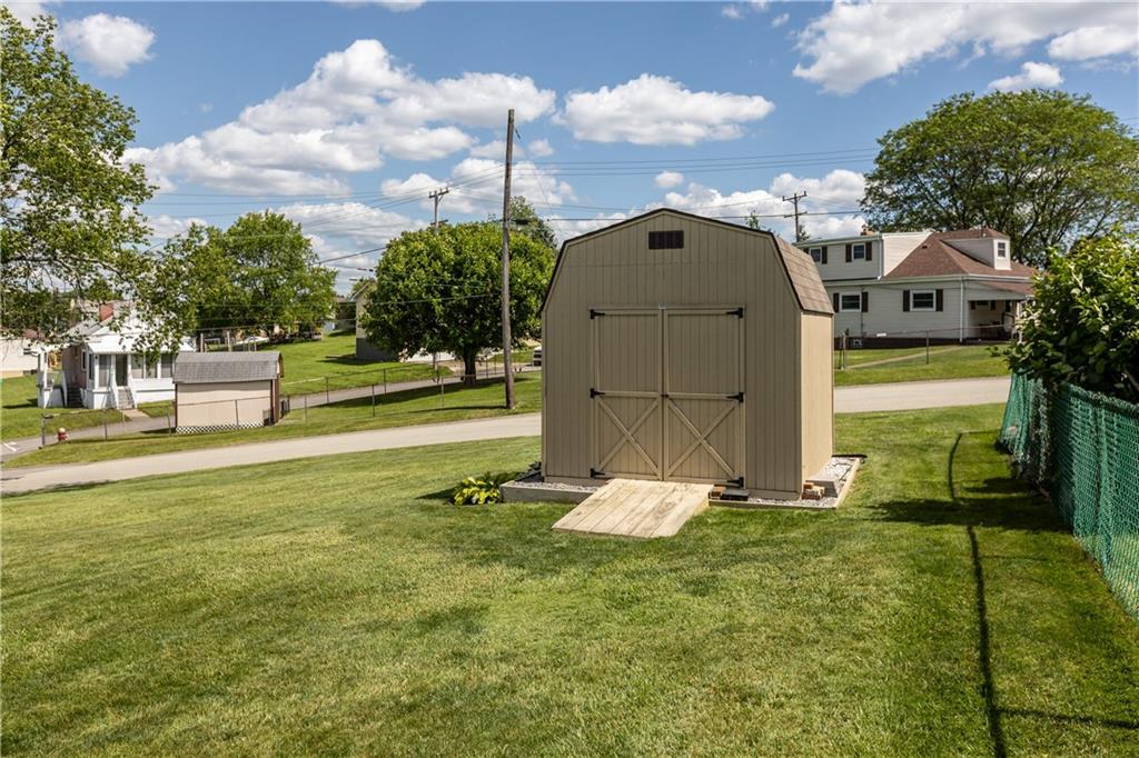 189 William Circle McKees Rocks, PA 15136 - Photo 4 of 24 a front view of a house with a yard
