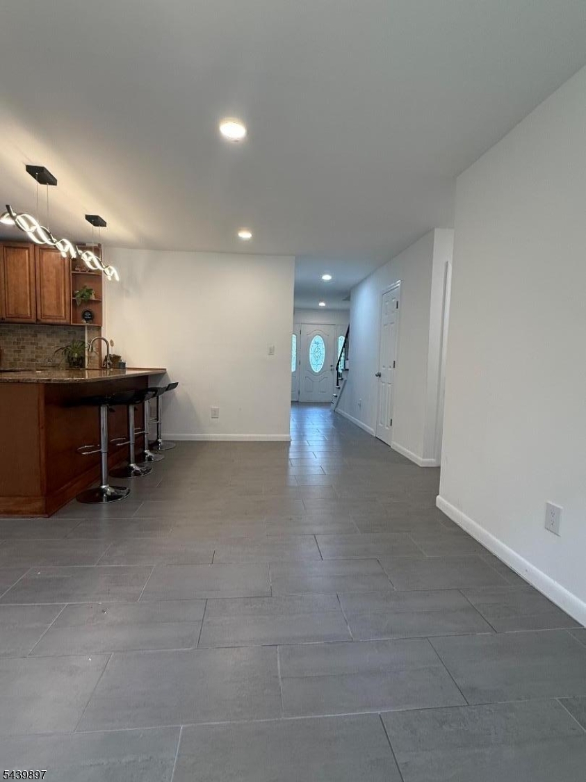 22 Karen Road Vernon, NJ 07422 - Photo 13 of 26 an empty room with a kitchen and a sink