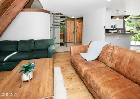 a living room with furniture and a couch