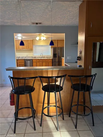 a bathroom with a toilet sink and shower