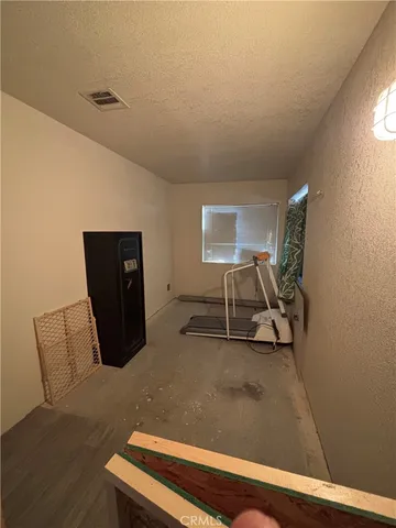 a bed room with furniture and a window