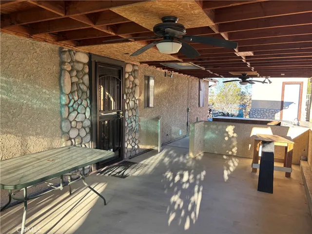 a view of a balcony with chairs