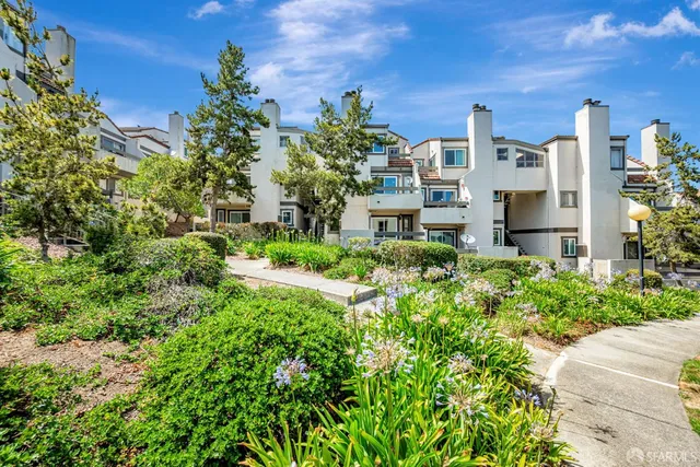 a view of a city with tall buildings