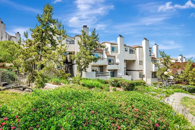 a view of a street with a building