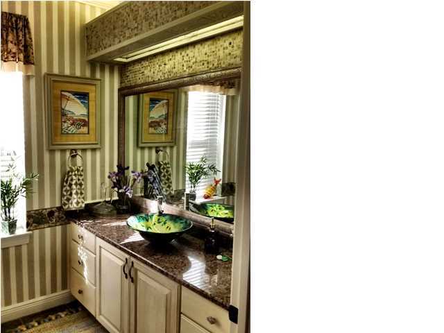 388 Shipwreck Road Santa Rosa Beach, FL 32459 - Photo 12 of 17 a kitchen with sink and large window