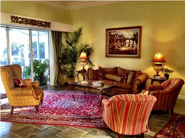 388 Shipwreck Road Santa Rosa Beach, FL 32459 - Photo 4 of 17 a living room with furniture a rug and a large window