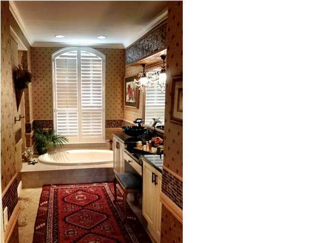 388 Shipwreck Road Santa Rosa Beach, FL 32459 - Photo 10 of 17 a view of a entryway with furniture and floor to ceiling window