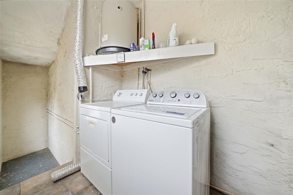 8334 Diagonal Road North St. Petersburg, FL 33702 - Photo 12 of 57 a utility room with dryer and washer
