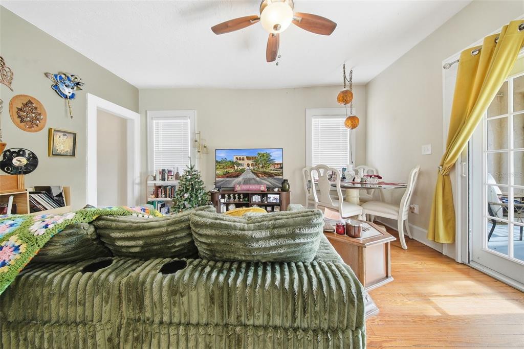 8334 Diagonal Road North St. Petersburg, FL 33702 - Photo 14 of 57 a living room with furniture and a large window