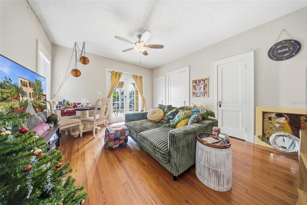 8334 Diagonal Road North St. Petersburg, FL 33702 - Photo 15 of 57 a living room with furniture and wooden floor