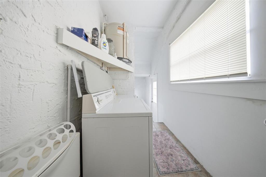 8334 Diagonal Road North St. Petersburg, FL 33702 - Photo 23 of 57 a utility room with dryer and washer