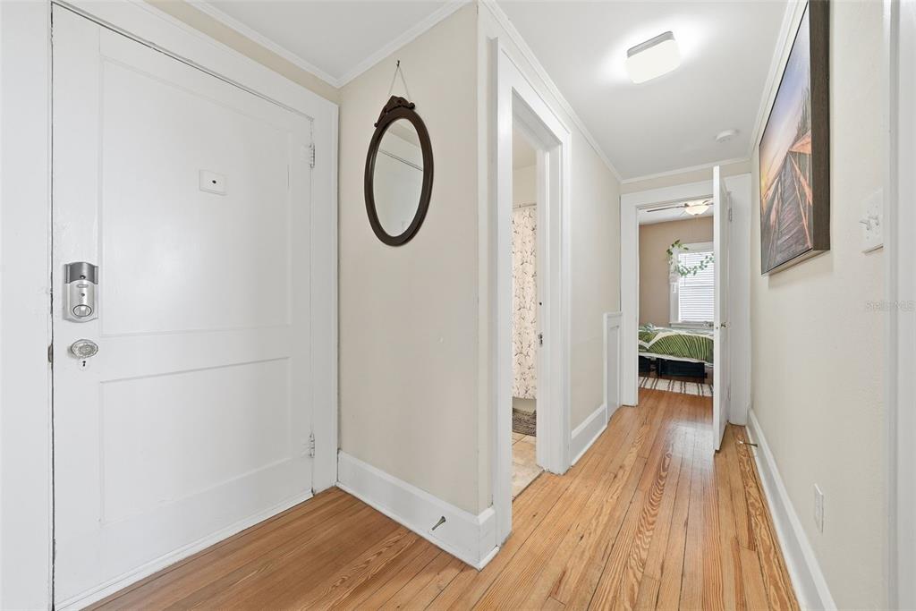 8334 Diagonal Road North St. Petersburg, FL 33702 - Photo 24 of 57 a view of a hallway with wooden floor