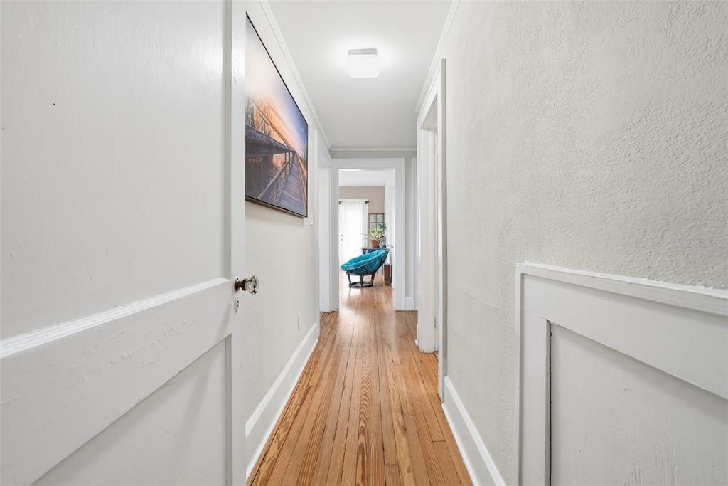 8334 Diagonal Road North St. Petersburg, FL 33702 - Photo 25 of 57 a view of a hallway view with wooden floor and staircase