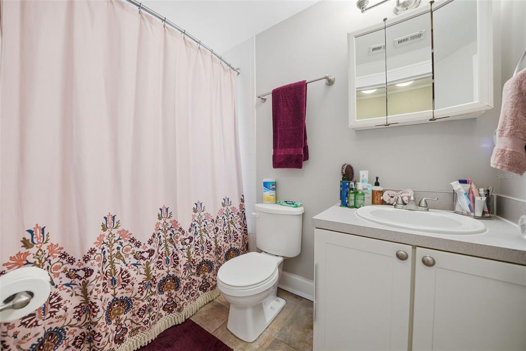 8334 Diagonal Road North St. Petersburg, FL 33702 - Photo 31 of 57 a bathroom with a sink toilet and shower