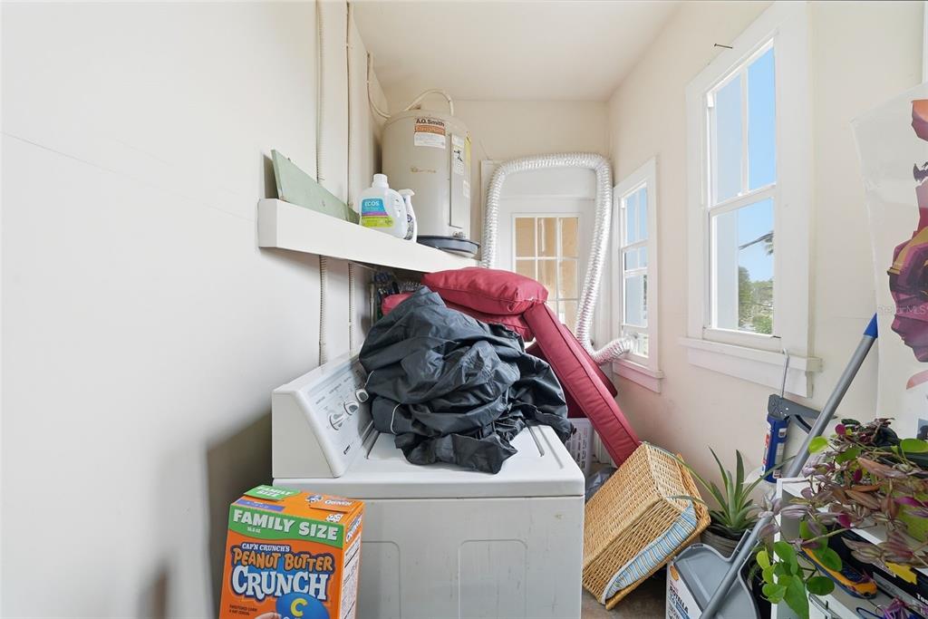 8334 Diagonal Road North St. Petersburg, FL 33702 - Photo 32 of 57 a living room with furniture and a fireplace