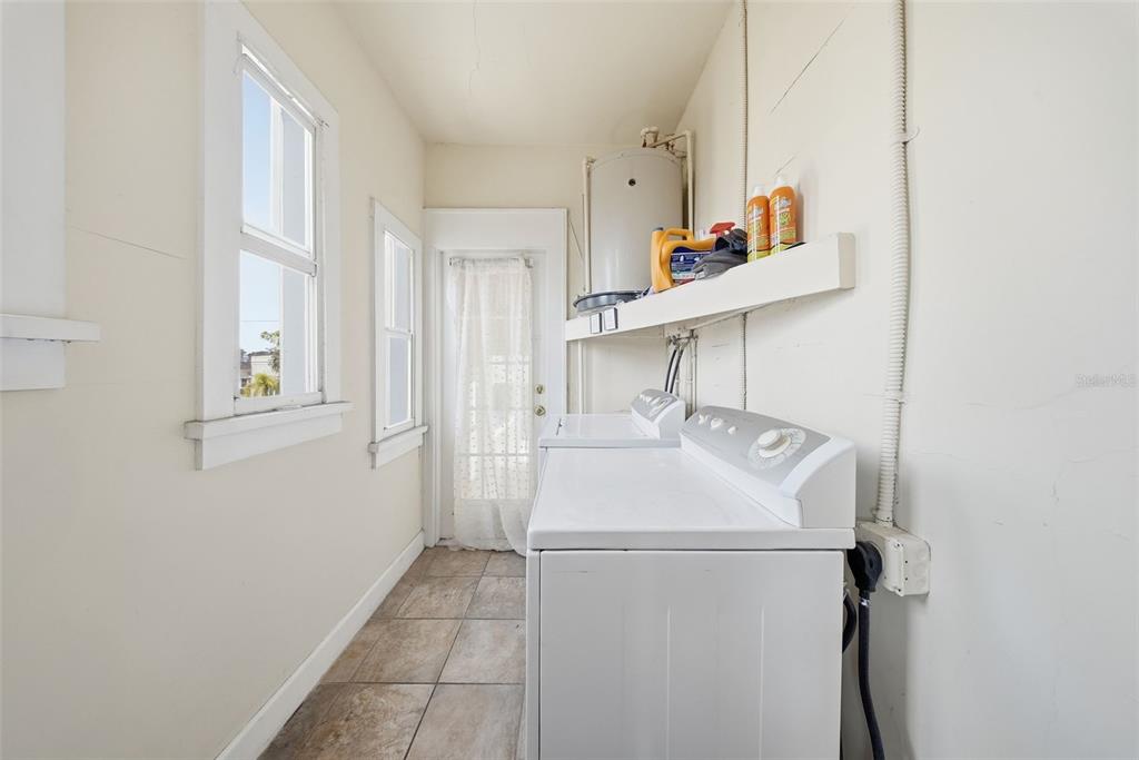 8334 Diagonal Road North St. Petersburg, FL 33702 - Photo 40 of 57 a utility room with dryer and washer