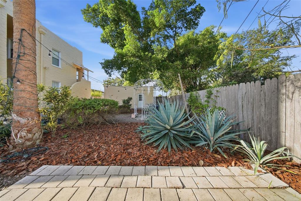 8334 Diagonal Road North St. Petersburg, FL 33702 - Photo 46 of 57 a potted plant sitting in front of a building
