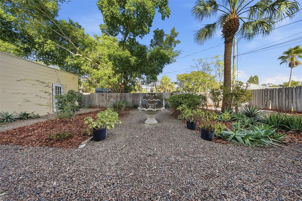 8334 Diagonal Road North St. Petersburg, FL 33702 - Photo 48 of 57 a backyard of a house with lots of green space