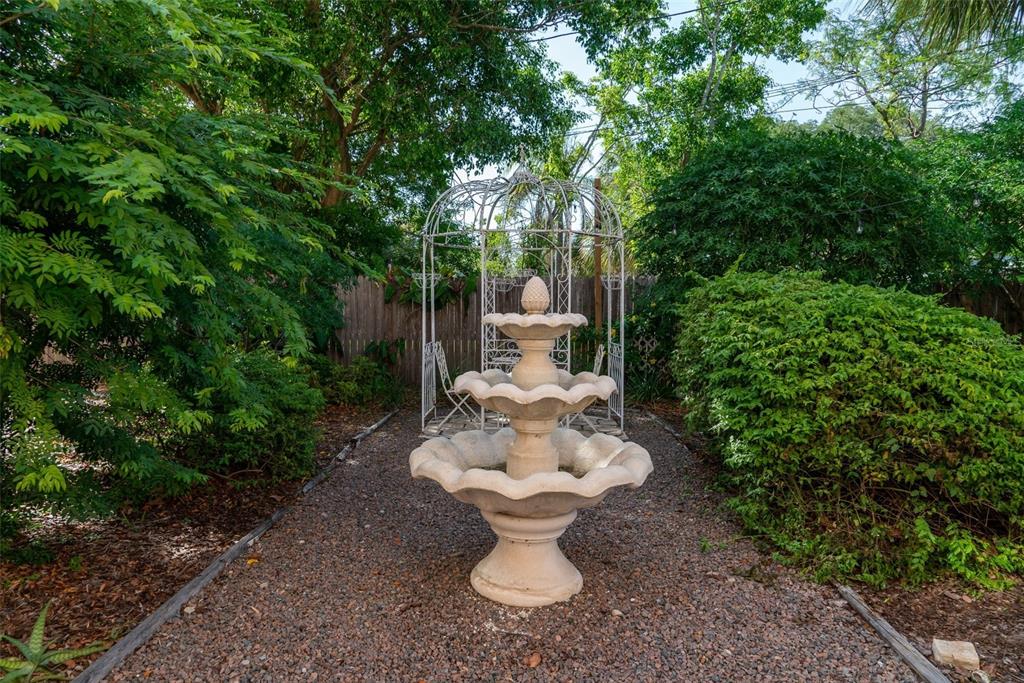 8334 Diagonal Road North St. Petersburg, FL 33702 - Photo 52 of 57 a view of a patio with table and chairs