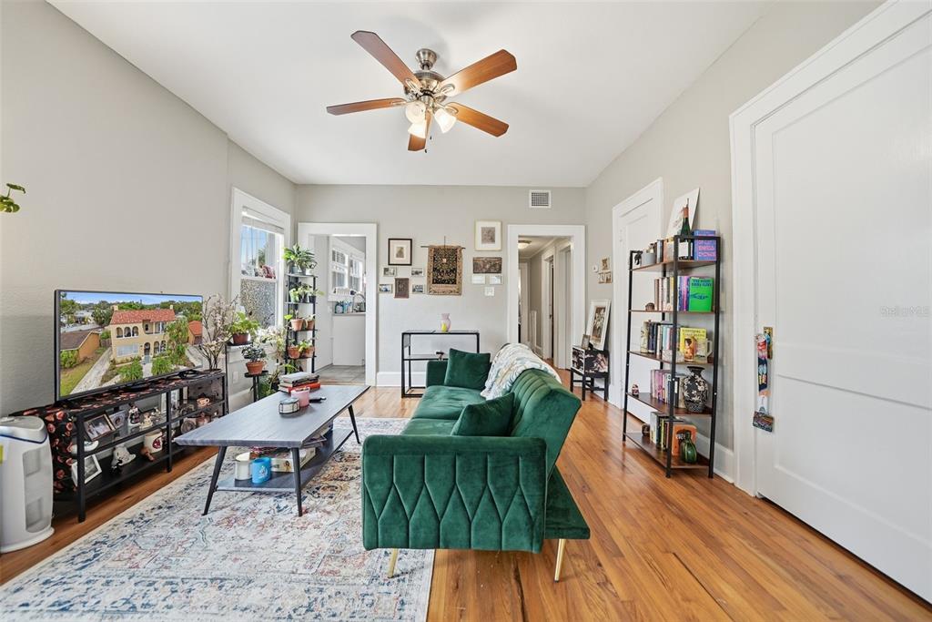 8334 Diagonal Road North St. Petersburg, FL 33702 - Photo 6 of 57 a living room with furniture and a flat screen tv