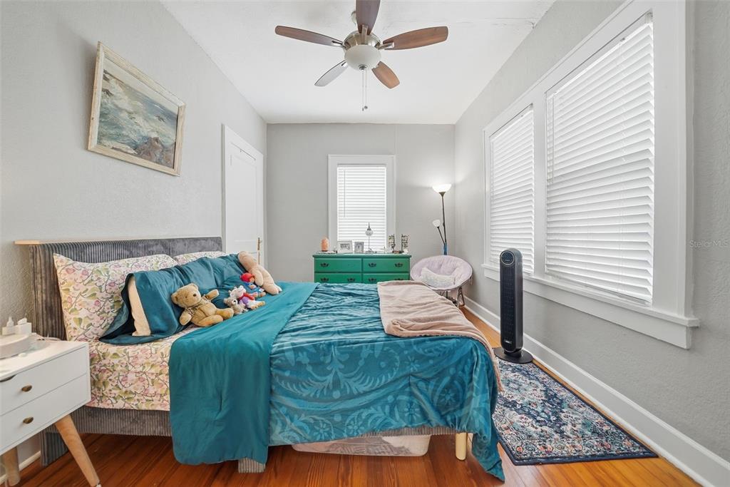 8334 Diagonal Road North St. Petersburg, FL 33702 - Photo 10 of 57 a living room with furniture and a window