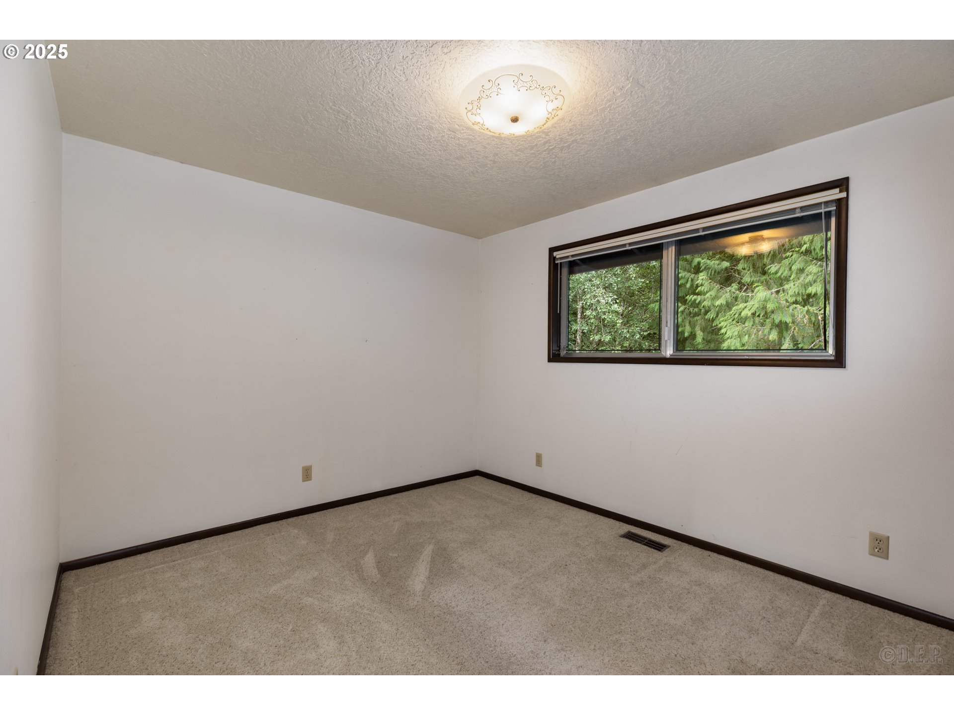 30004 Scappoose Vernonia Highway Scappoose, OR 97056 - Photo 12 of 33 a view of an empty room with a window