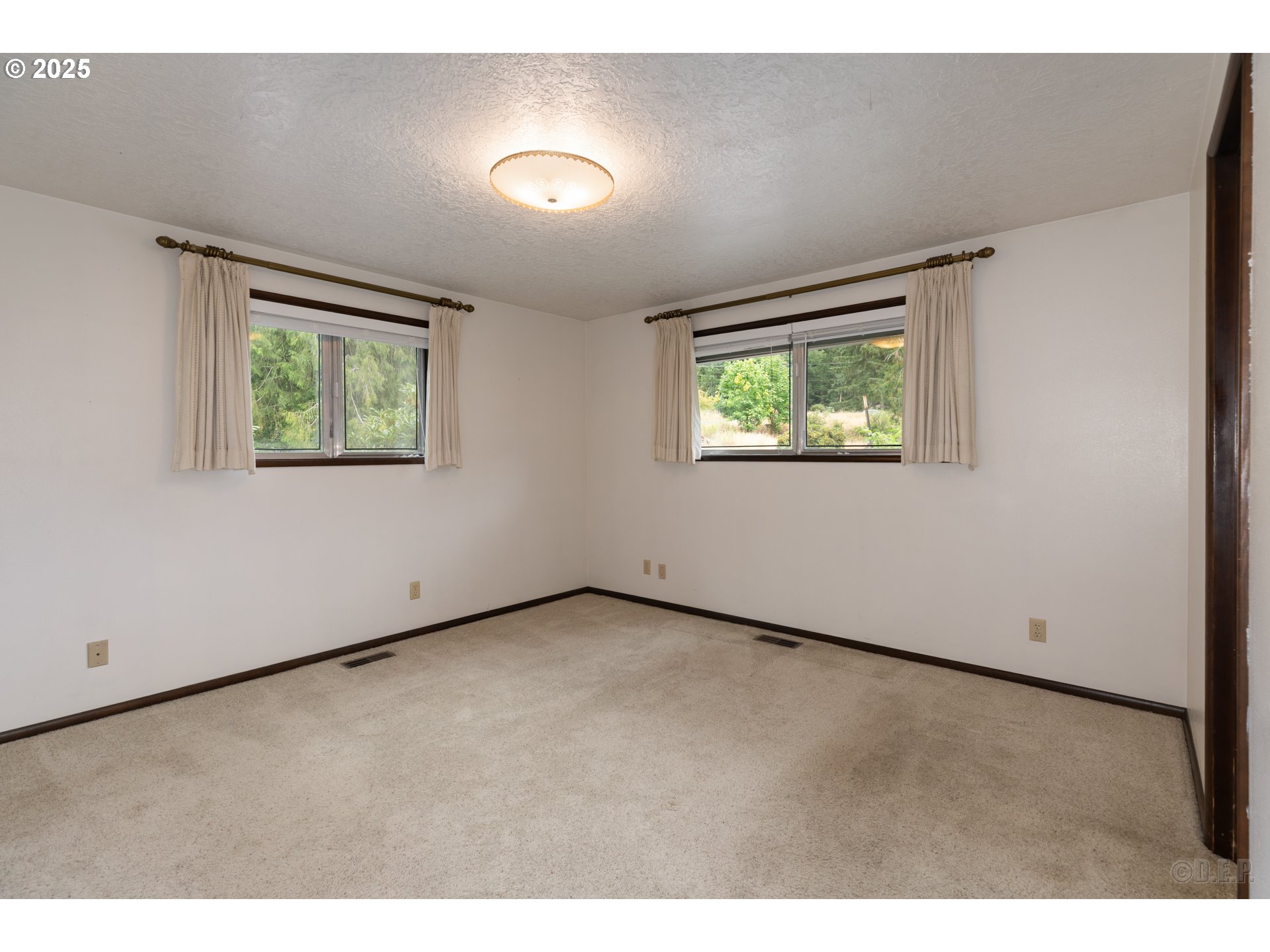 30004 Scappoose Vernonia Highway Scappoose, OR 97056 - Photo 8 of 33 an empty room with windows