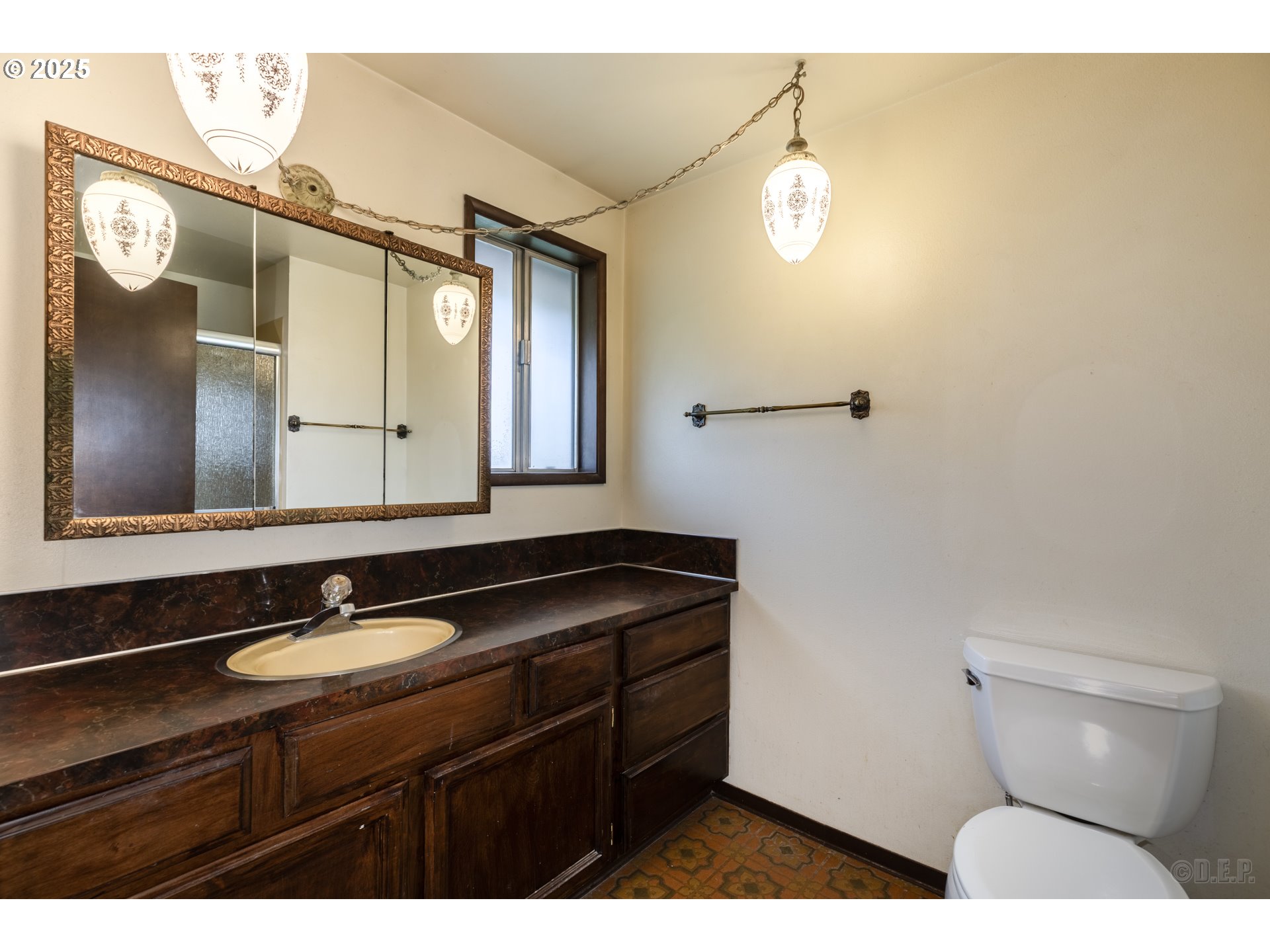 30004 Scappoose Vernonia Highway Scappoose, OR 97056 - Photo 9 of 33 a bathroom with a sink a mirror and a toilet