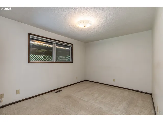 a view of empty room with window