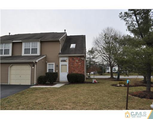 151 Skipton Place Somerset, NJ 08873 - Photo 1 of 10 a view of a house with a back yard