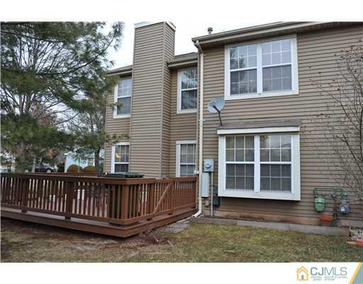 151 Skipton Place Somerset, NJ 08873 - Photo 2 of 10 a view of a house with a deck