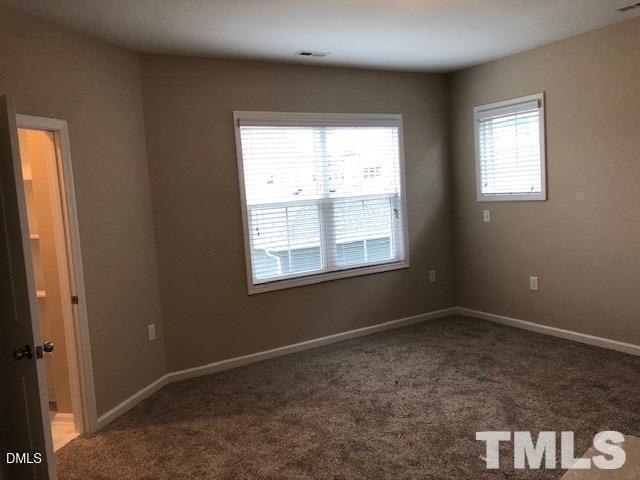1600 Silo Ridge Drive Wake Forest, NC 27587 - Photo 12 of 16 an empty room with a window