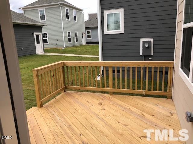 1600 Silo Ridge Drive Wake Forest, NC 27587 - Photo 14 of 16 a view of backyard with deck