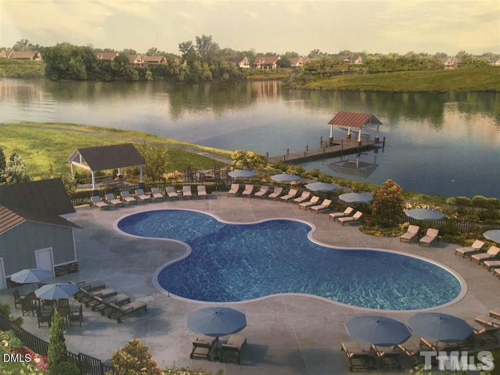 1600 Silo Ridge Drive Wake Forest, NC 27587 - Photo 16 of 16 an aerial view of a house with outdoor space and a lake view