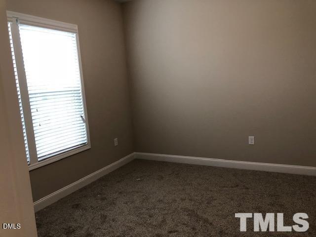 1600 Silo Ridge Drive Wake Forest, NC 27587 - Photo 6 of 16 an empty room with a window