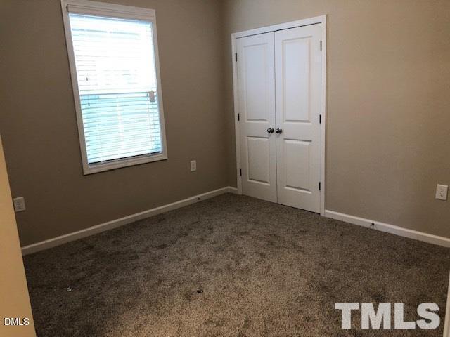 1600 Silo Ridge Drive Wake Forest, NC 27587 - Photo 8 of 16 an empty room with a window