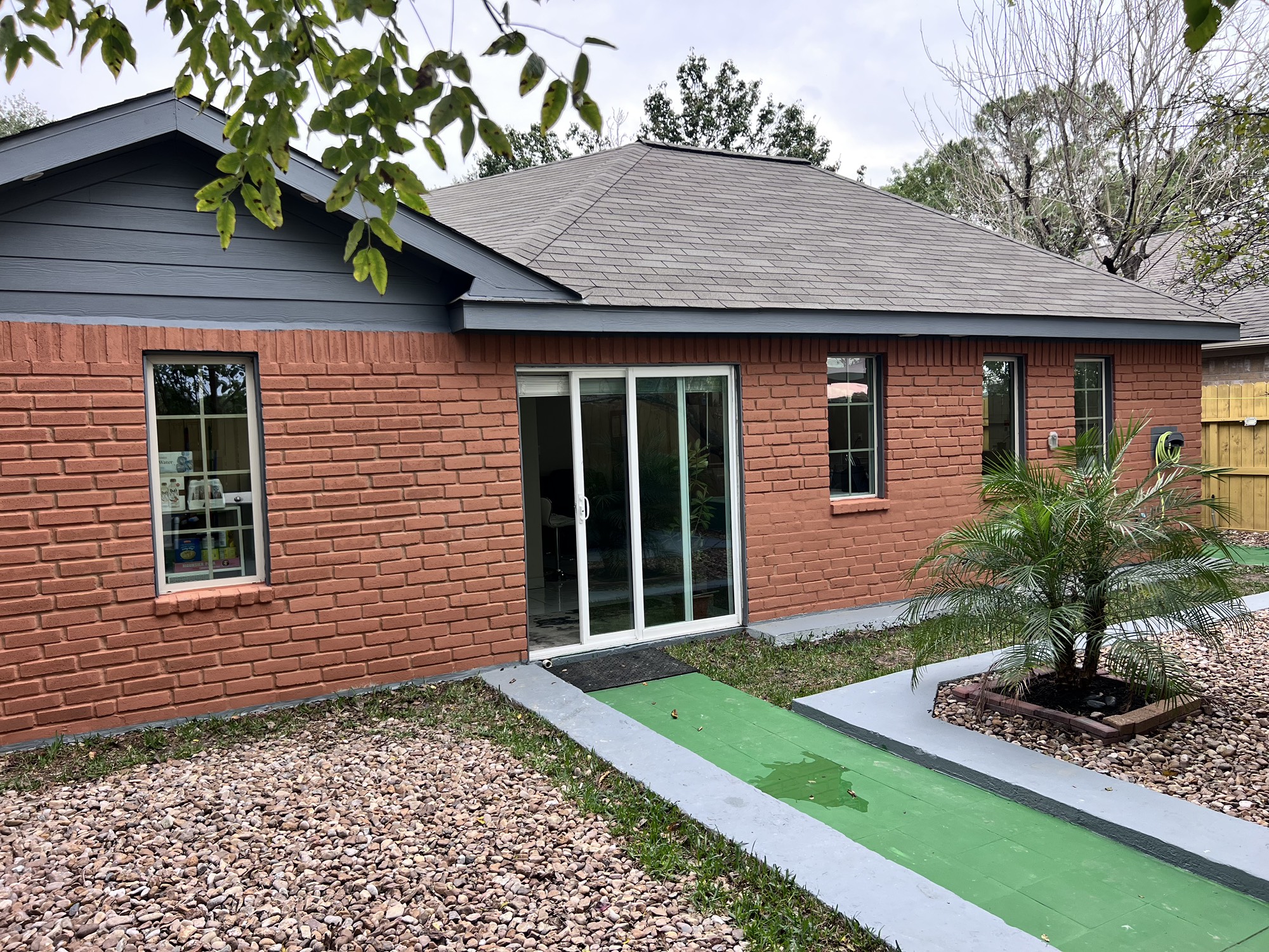 10807 Spring Harvest Drive Houston, TX 77064 - Photo 10 of 12 a front view of a house with garden